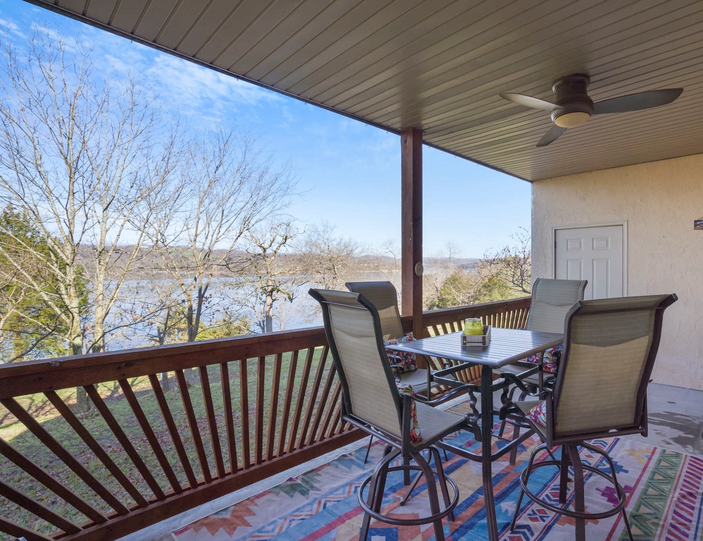 Beautiful lake view from back deck with outdoor seating