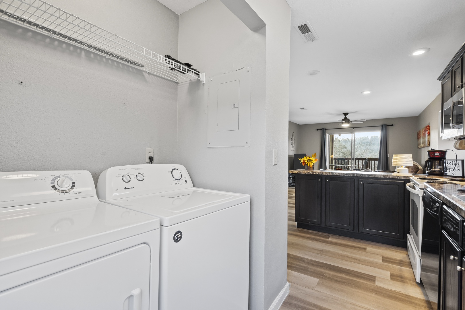 Private laundry is available for your stay, tucked away in the kitchen area
