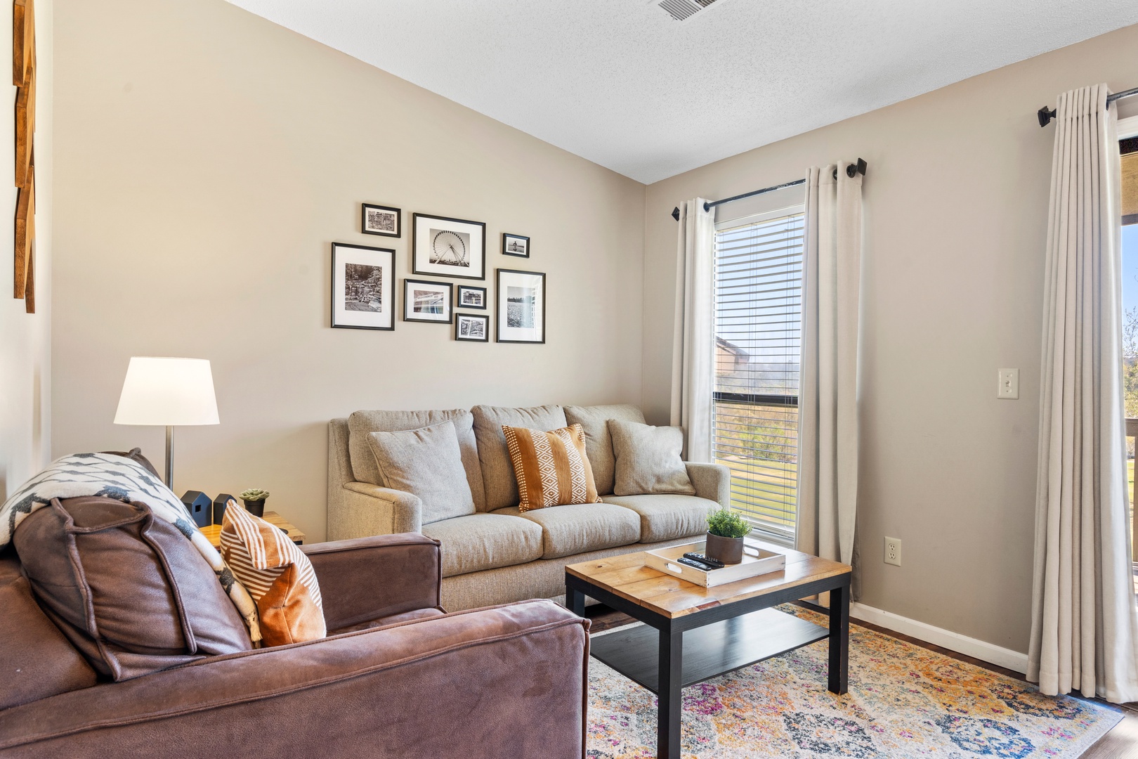 Curl up in Unit 19’s inviting living room & enjoy a movie night at home
