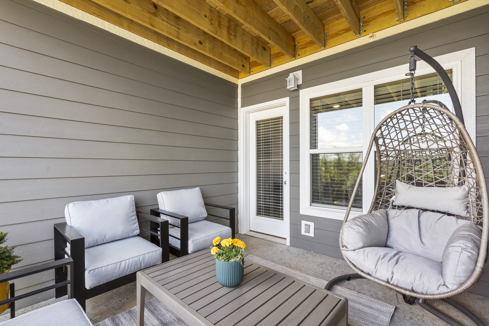 Relax on the chair swing and enjoy the covered balcony with beautiful view