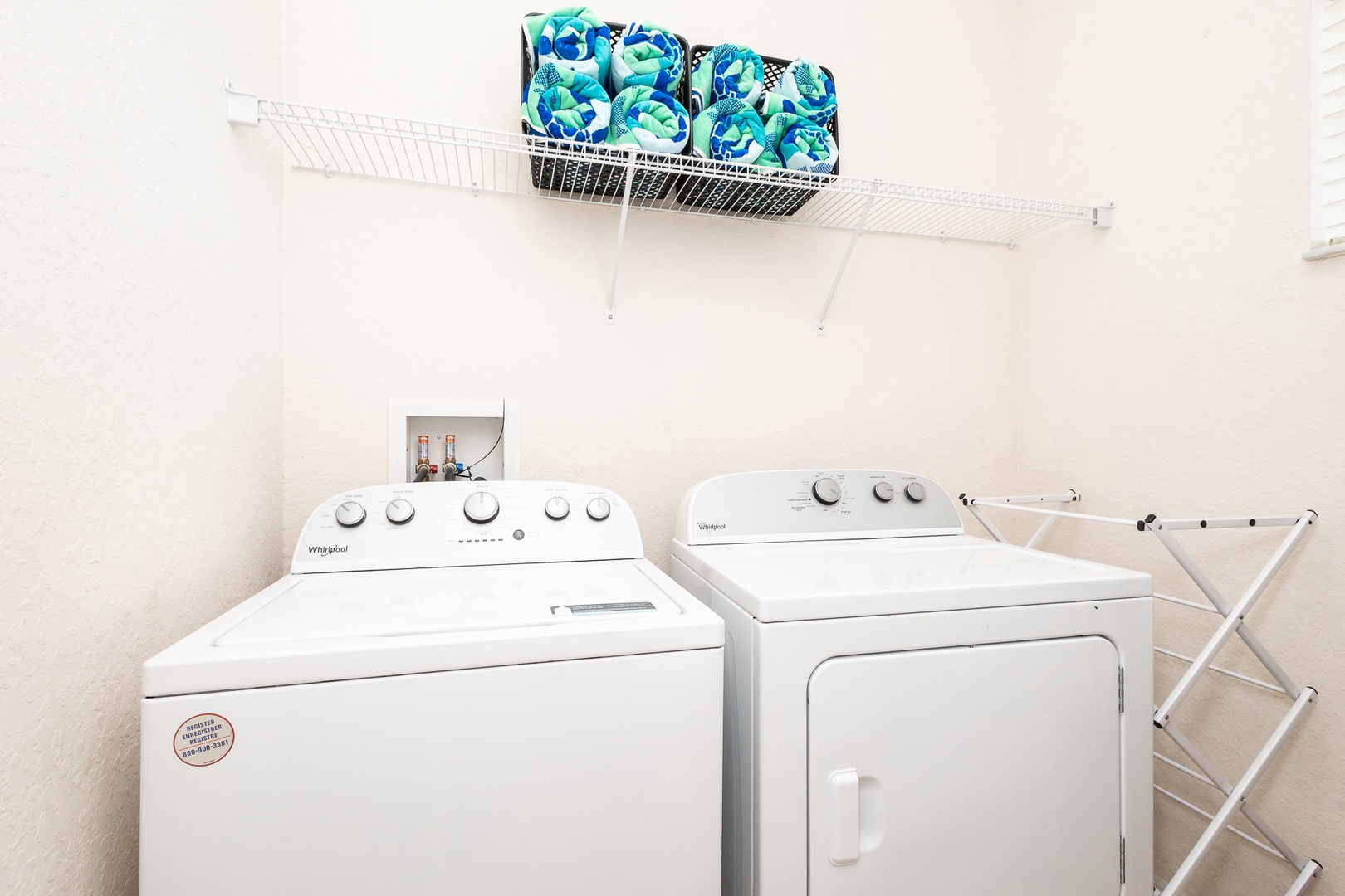 Private laundry is available for your stay, tucked away off the entry