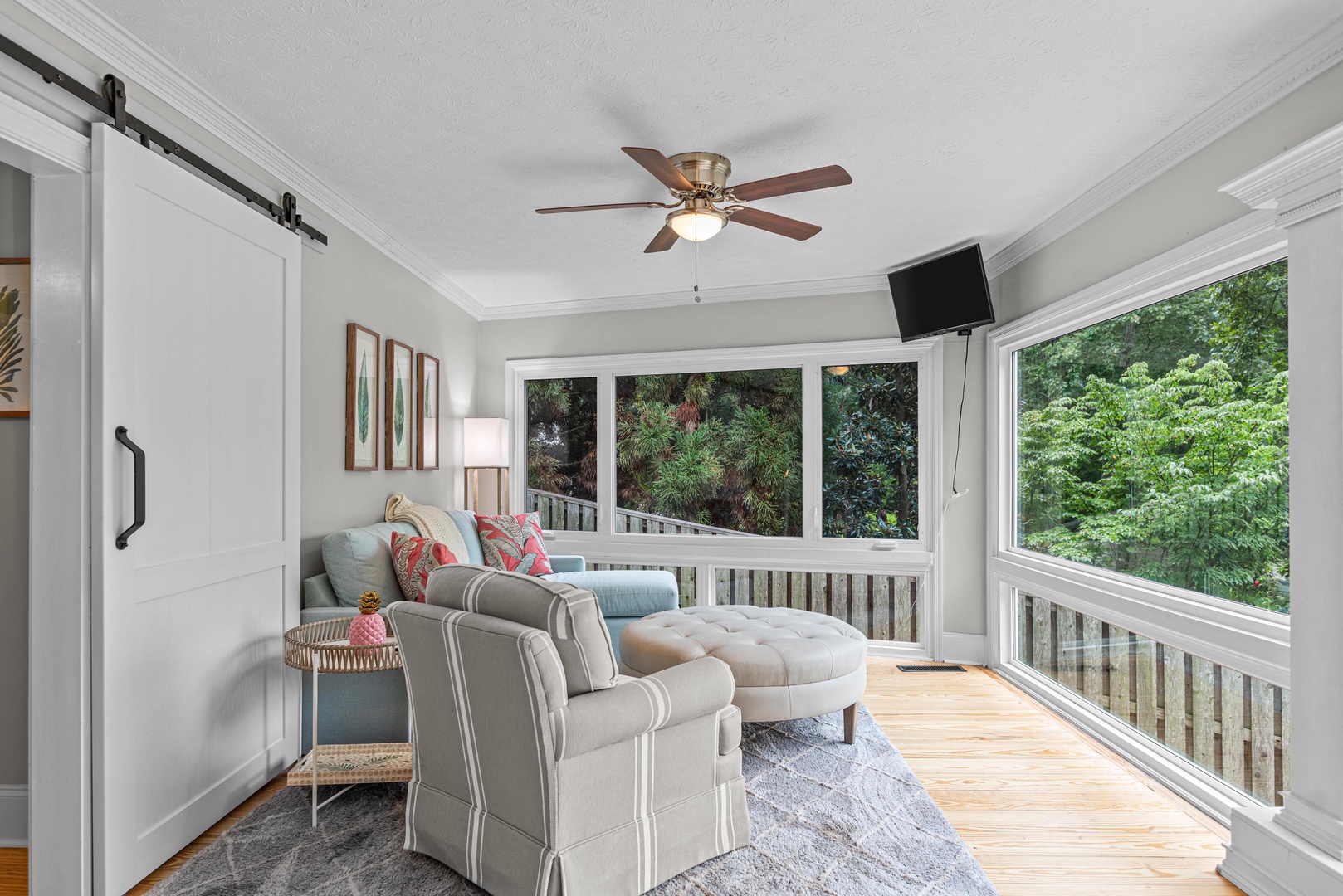 Unwind in the sunroom with lake views or enjoy a movie together