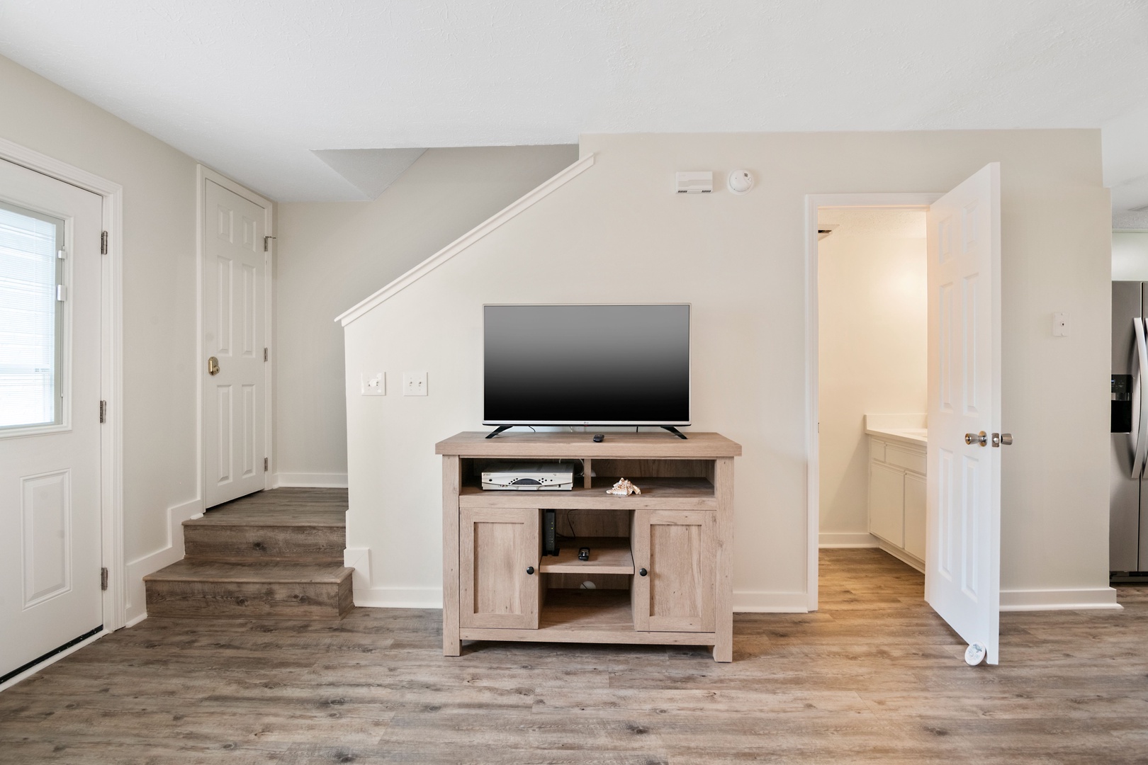 A convenient powder room is available on the first floor