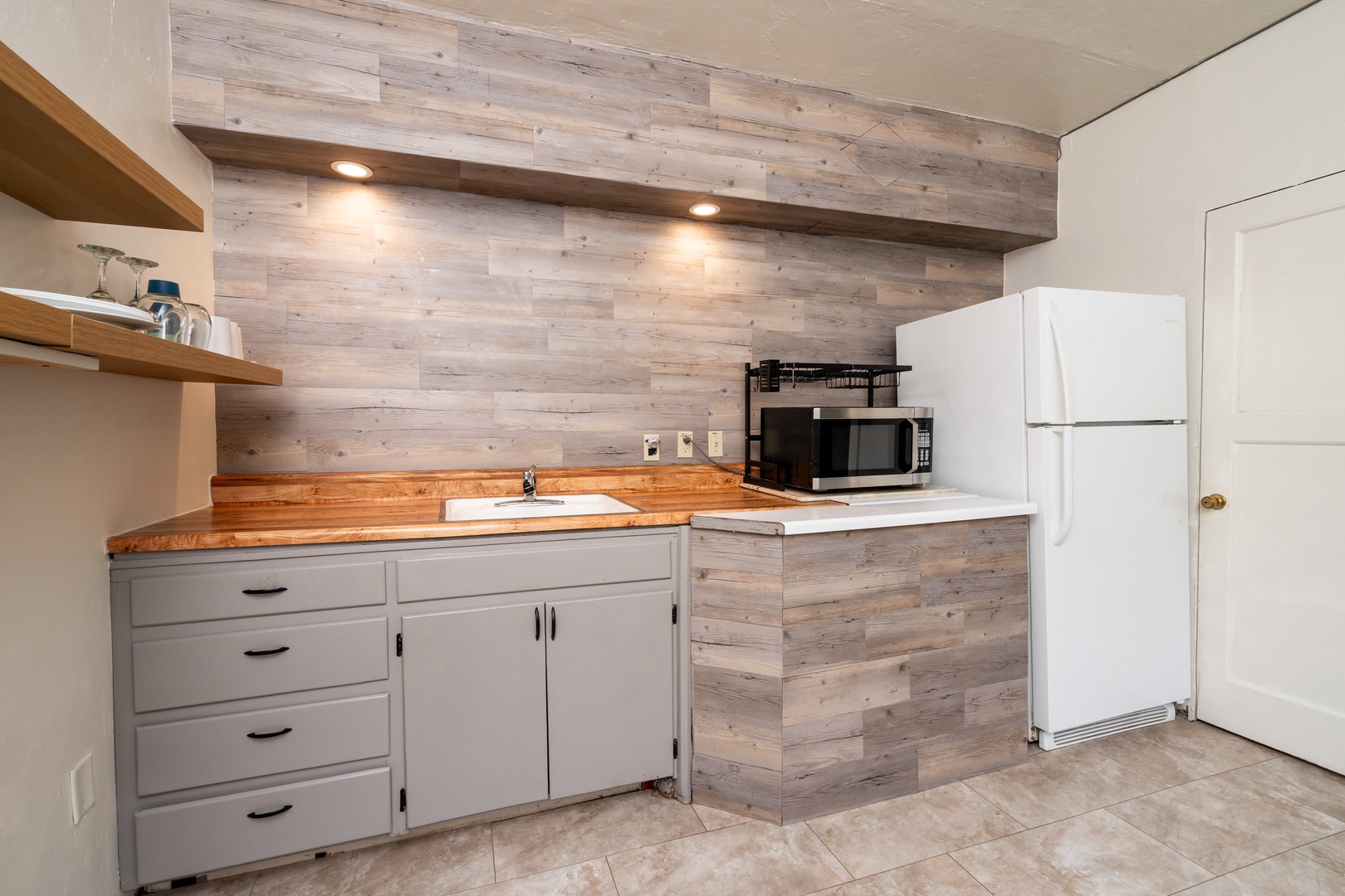 The eat-in kitchen offers a comfortable atmosphere with ample amenities
