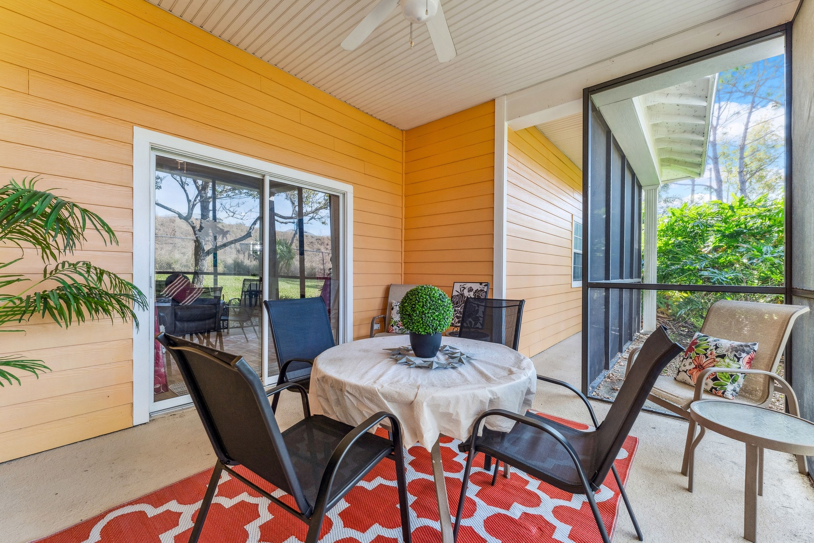 Dine alfresco or enjoy a cocktail on the screened patio