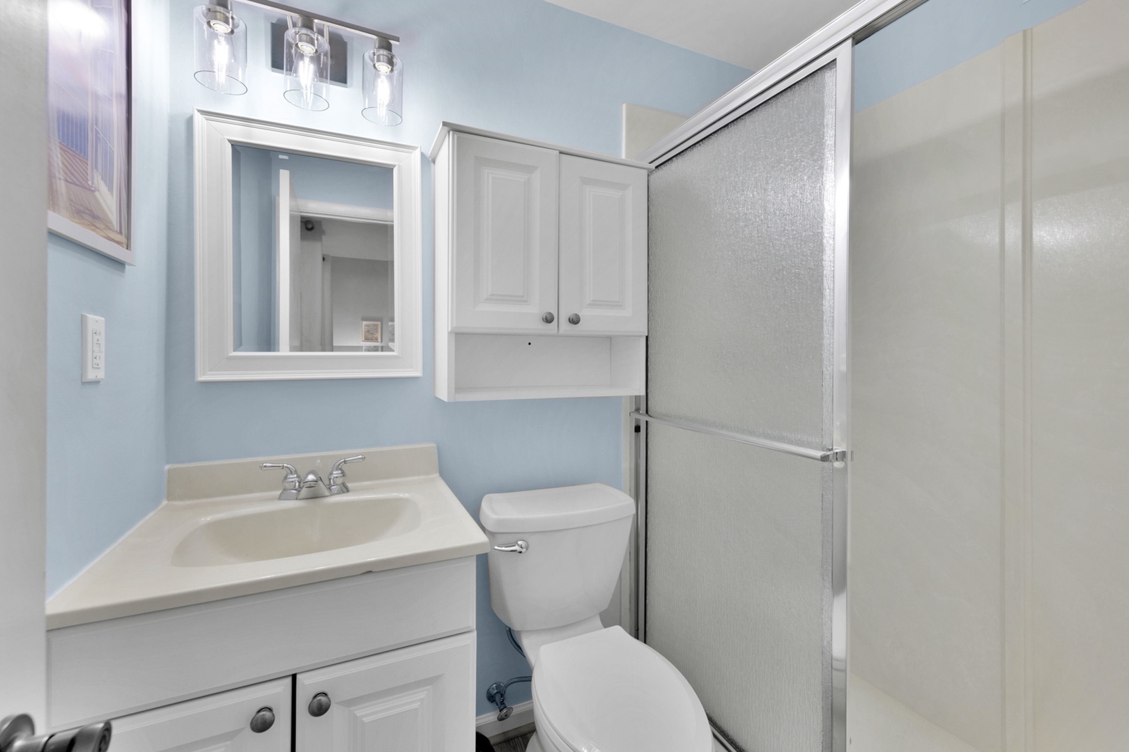 The king ensuite offers a single vanity & glass shower