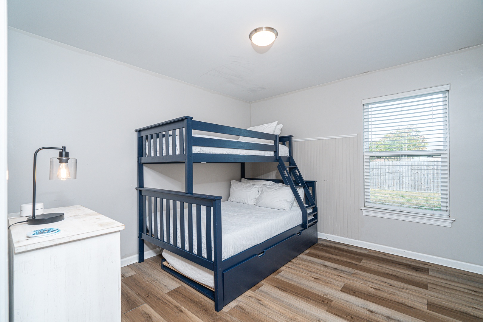 This 1st floor bedroom offers a twin-over-full bunkbed & twin trundle