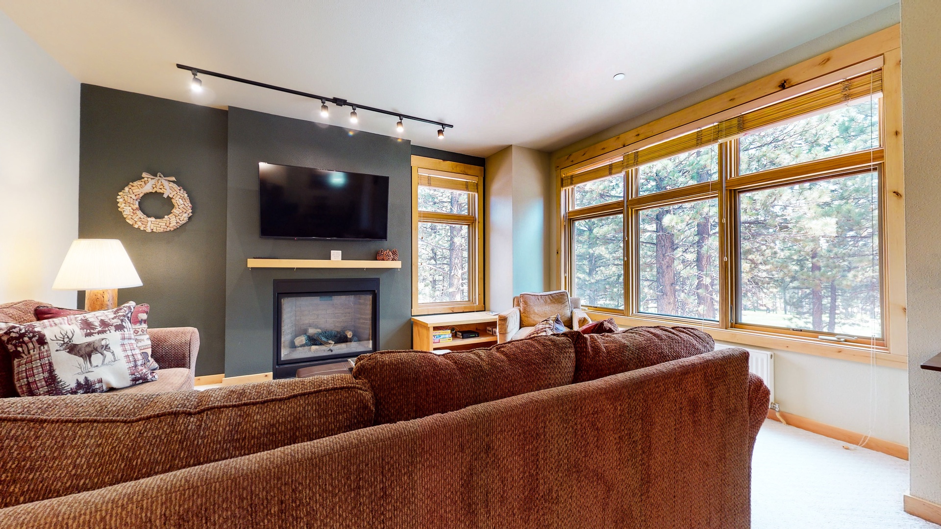 Living room with sofa sleeper, Smart TV, gas fireplace