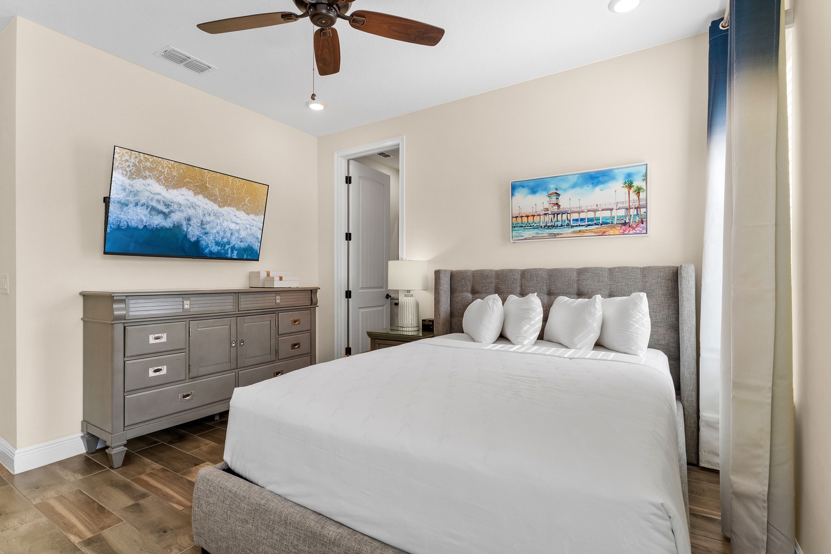 Bedroom 1 with queen bed, Smart & cable TV, and ensuite