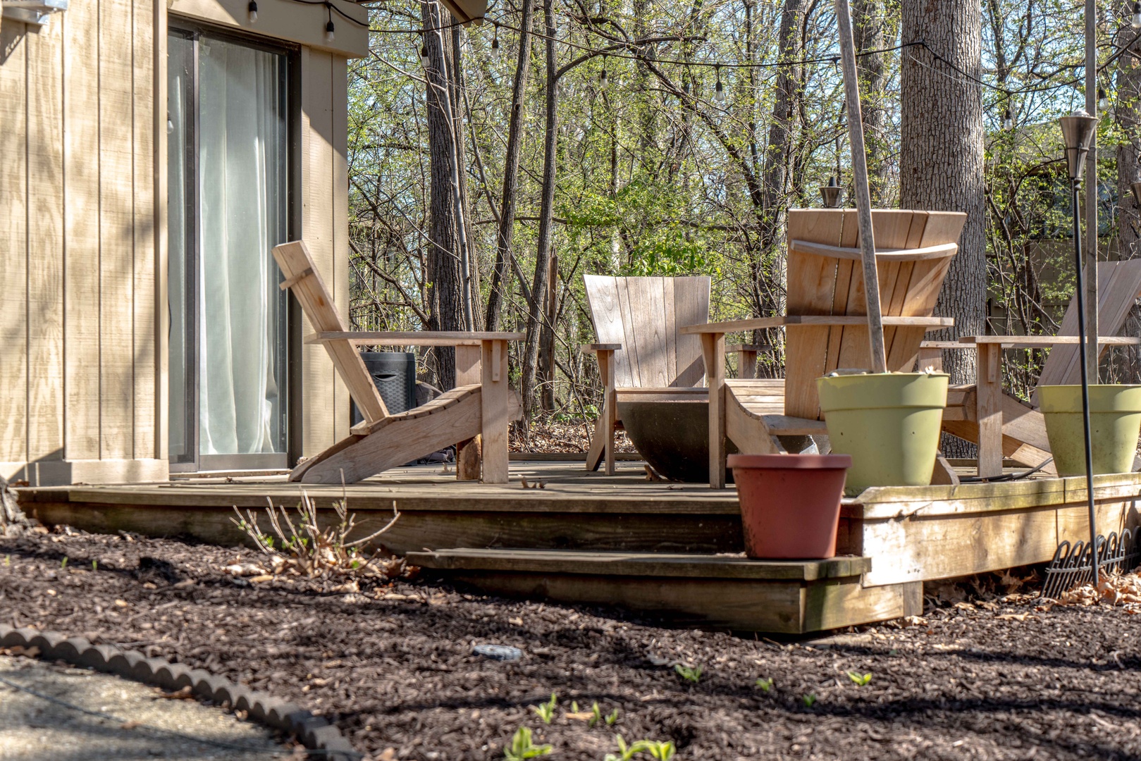 Lounge the day away around the firepit & make memories under the trees