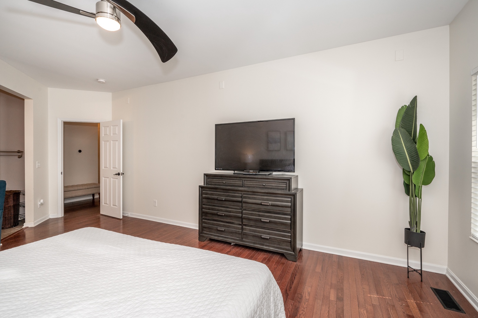 The 1st floor king suite boasts a Smart TV, walk-in closet, & private en suite