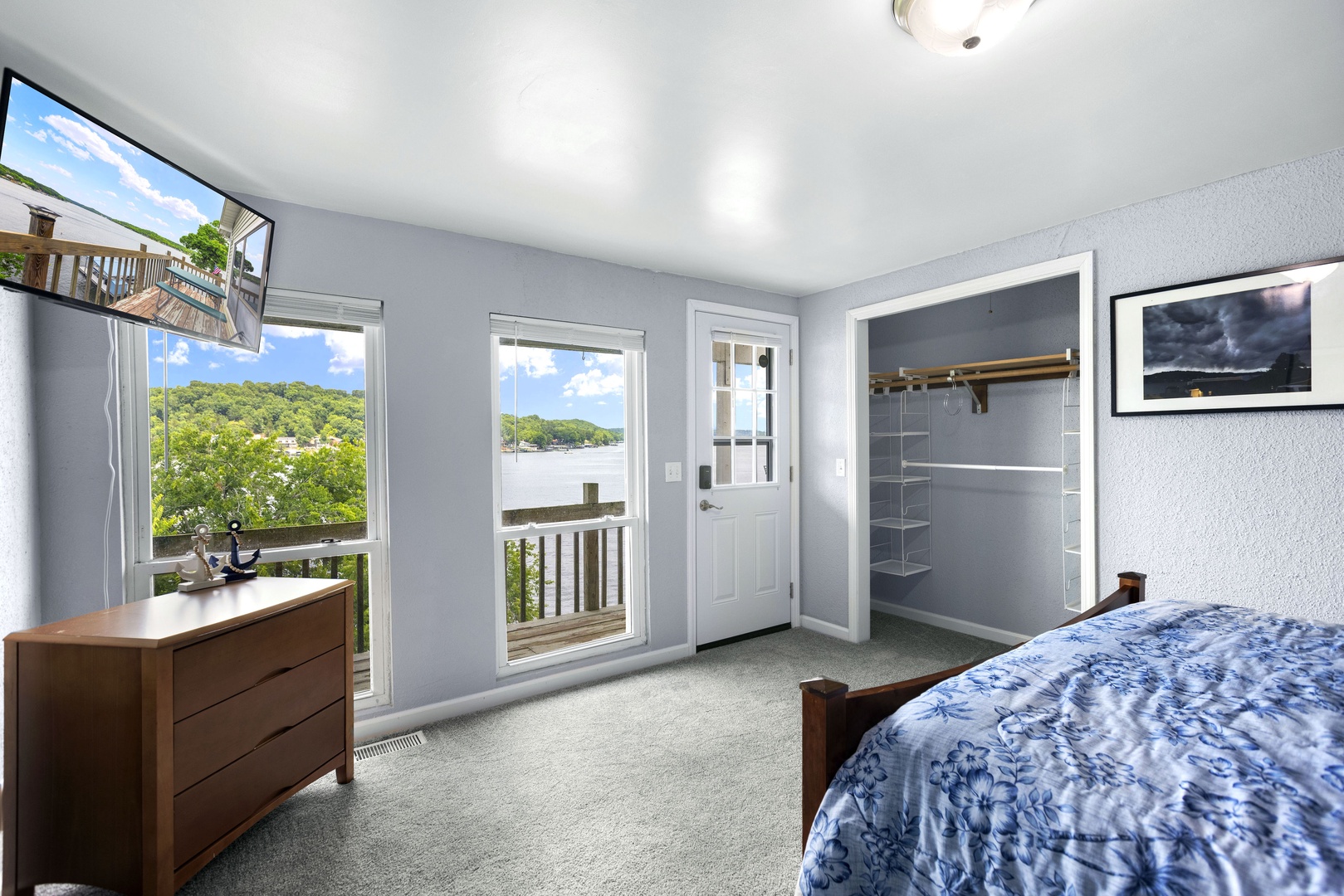 A queen bed & Smart TV is available in this lower-level bedroom