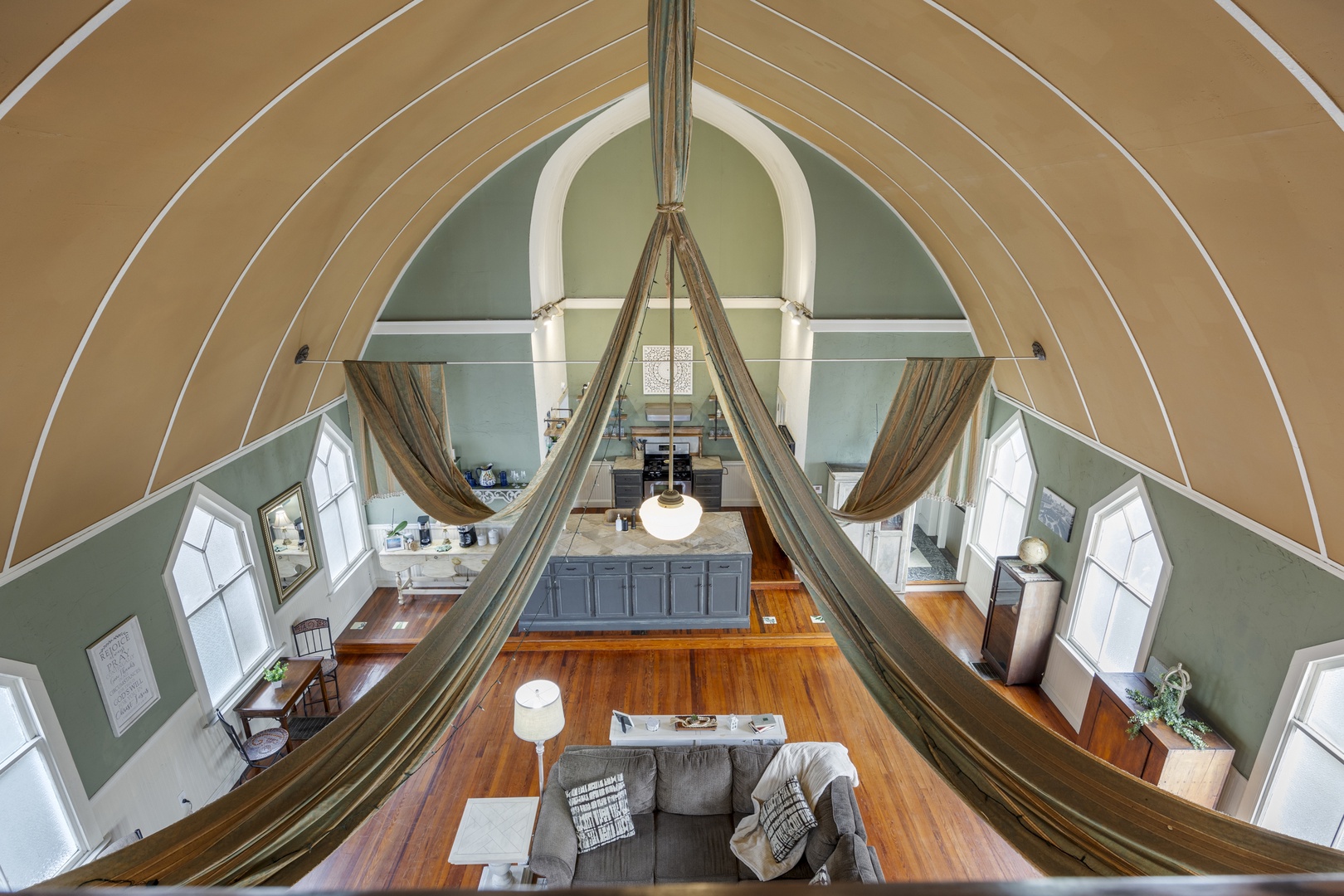 Recharge in the loft sleeping area, boasting a plush queen-sized bed