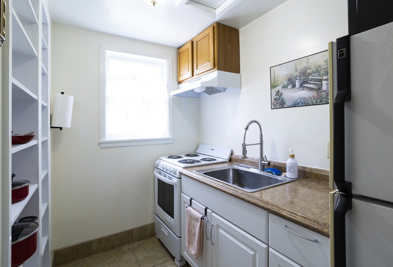 The kitchen hits all the marks with a stove, oven and microwave