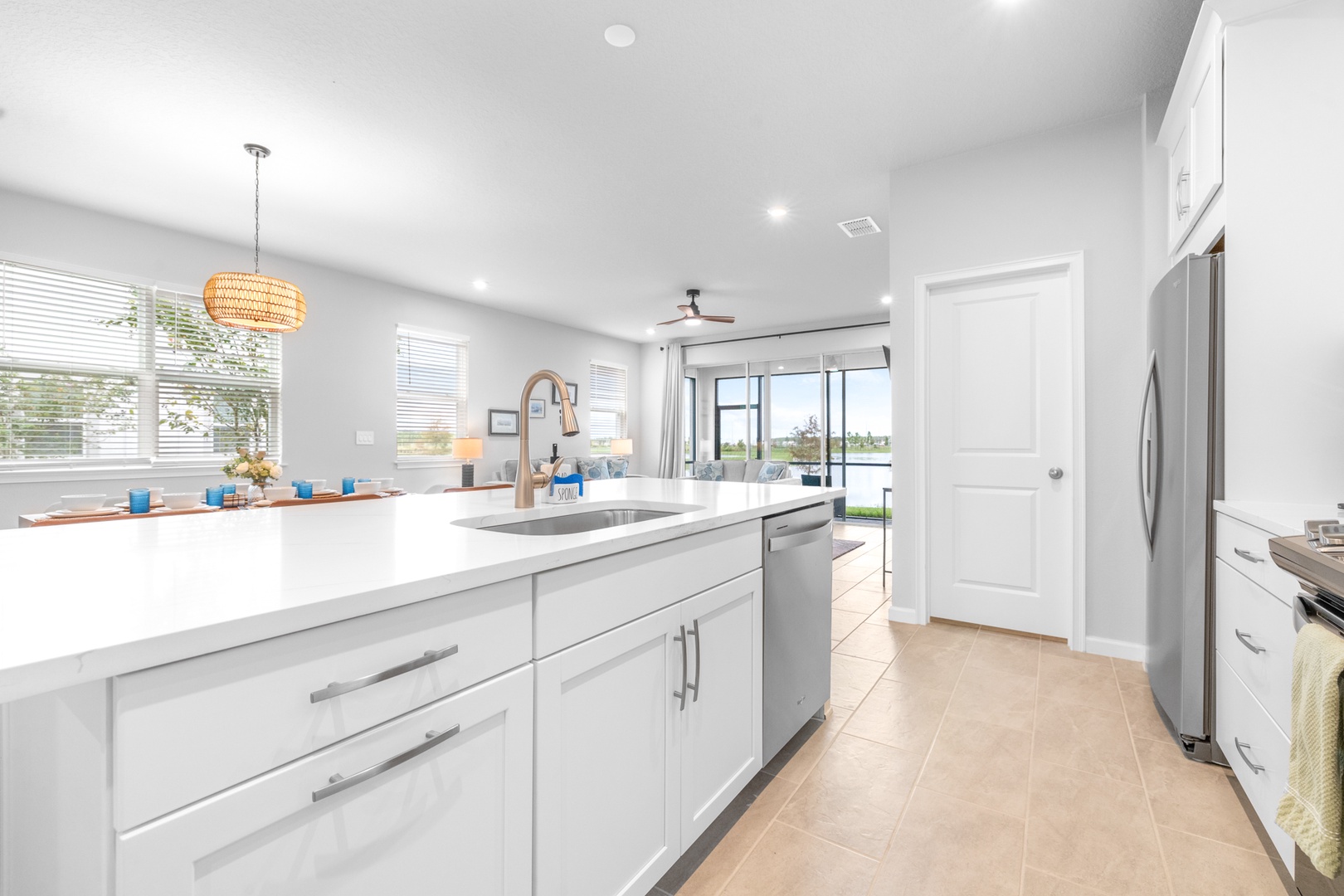 The open, airy kitchen offers ample space & all the comforts of home