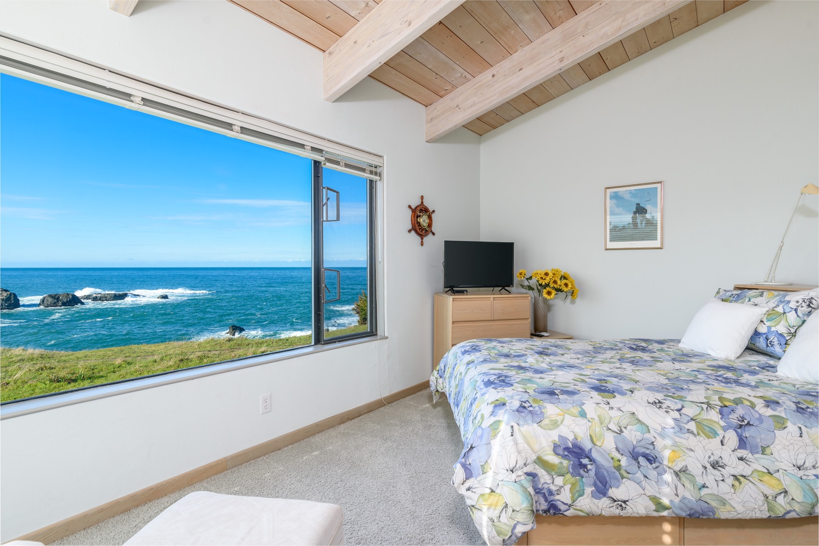 Bedroom #1 after amazing views. with a door  opening to the ocean & bluffs