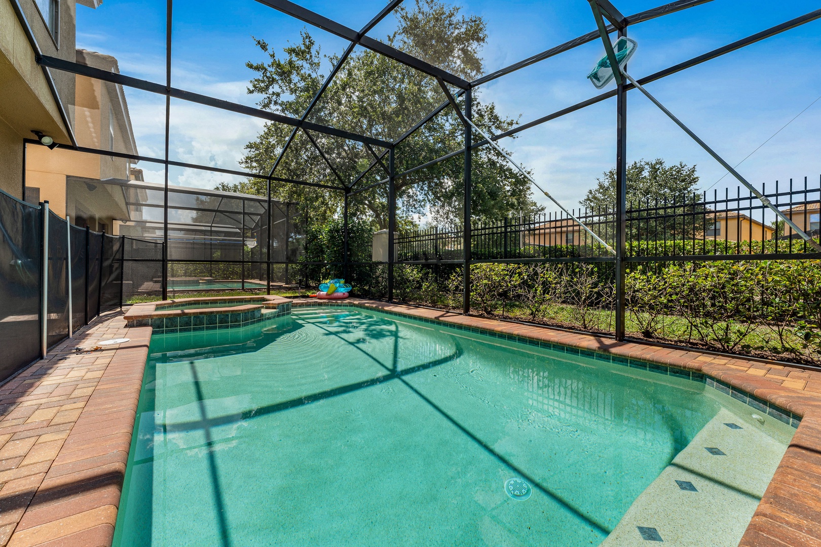 Screened in pool with outdoor seating