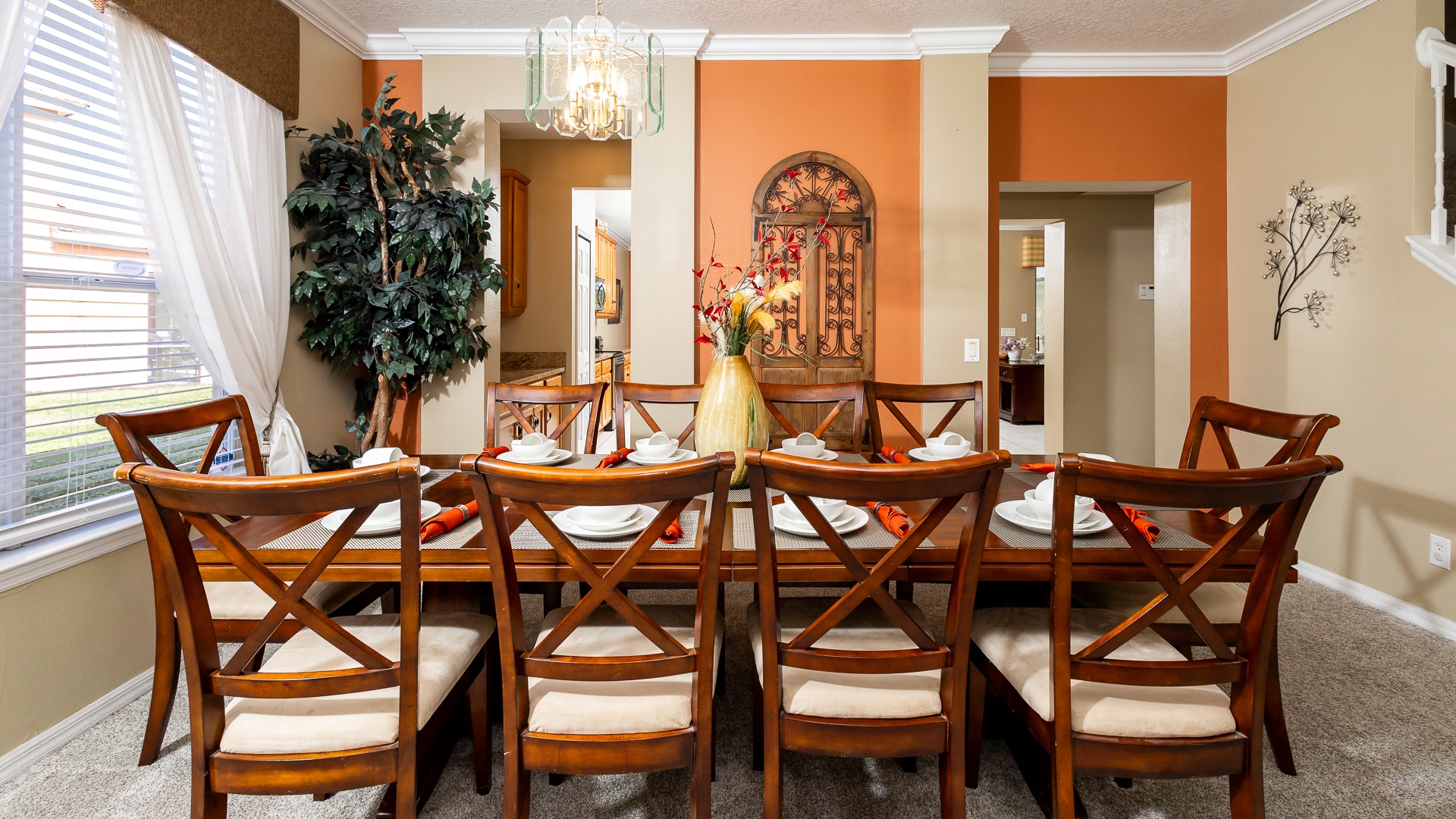Elegant meals can be enjoyed at the formal dining table, with seating for 10