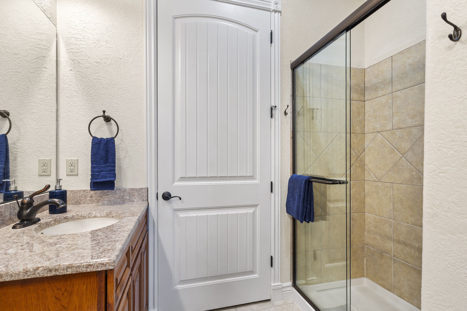 Bathroom 2 en-suite with double vanity, separate shower, and soaking tub