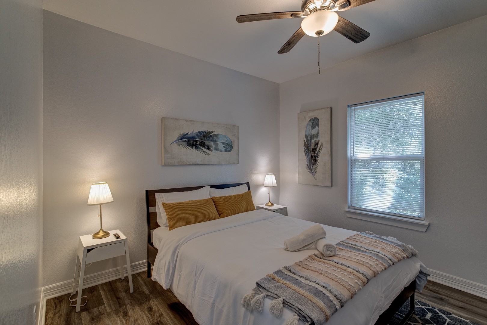 The third bedroom sanctuary showcases a queen-sized bed & Smart TV