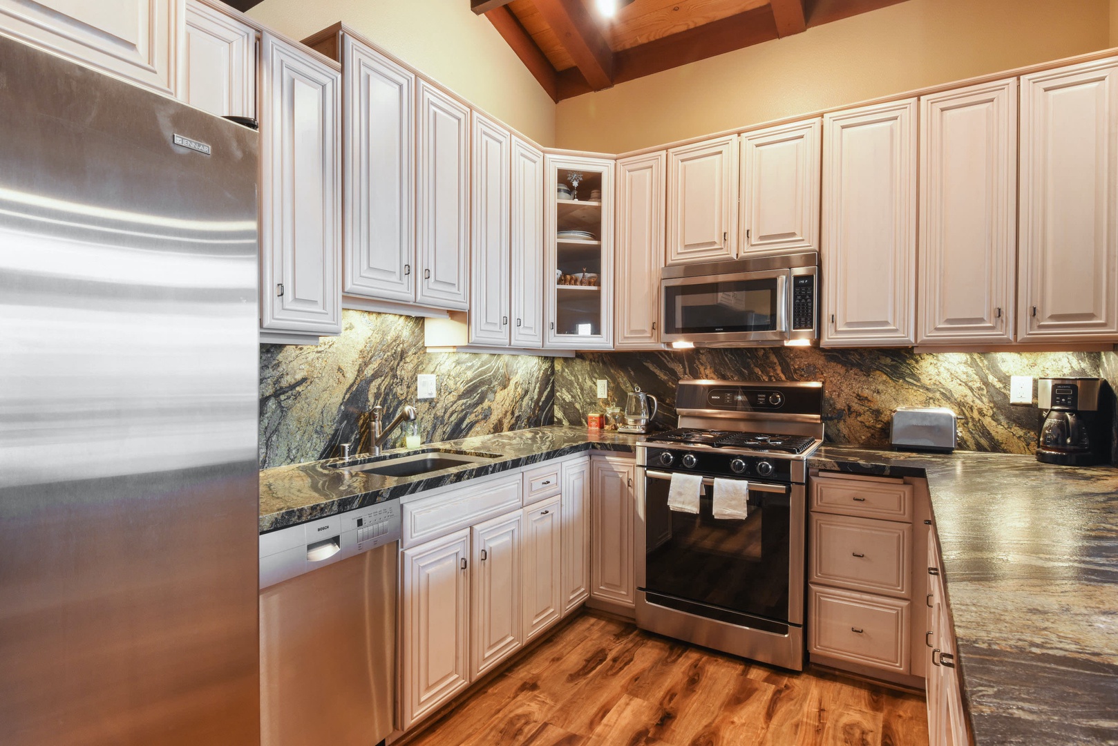 Kitchen with drip coffee maker, electric kettle, toaster and more