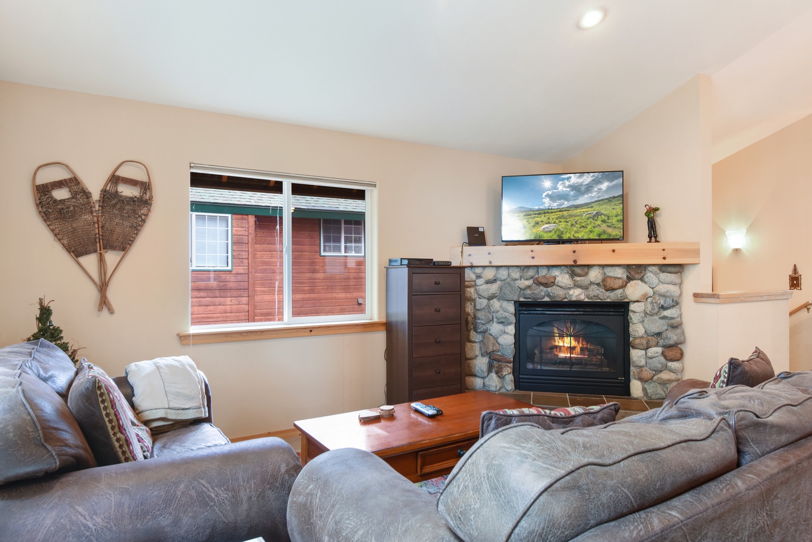 Living room with Smart/cable TV, gas fireplace and comfortable seating