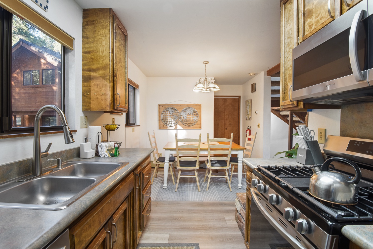 The cozy kitchen is well-equipped and will have you feeling right at home