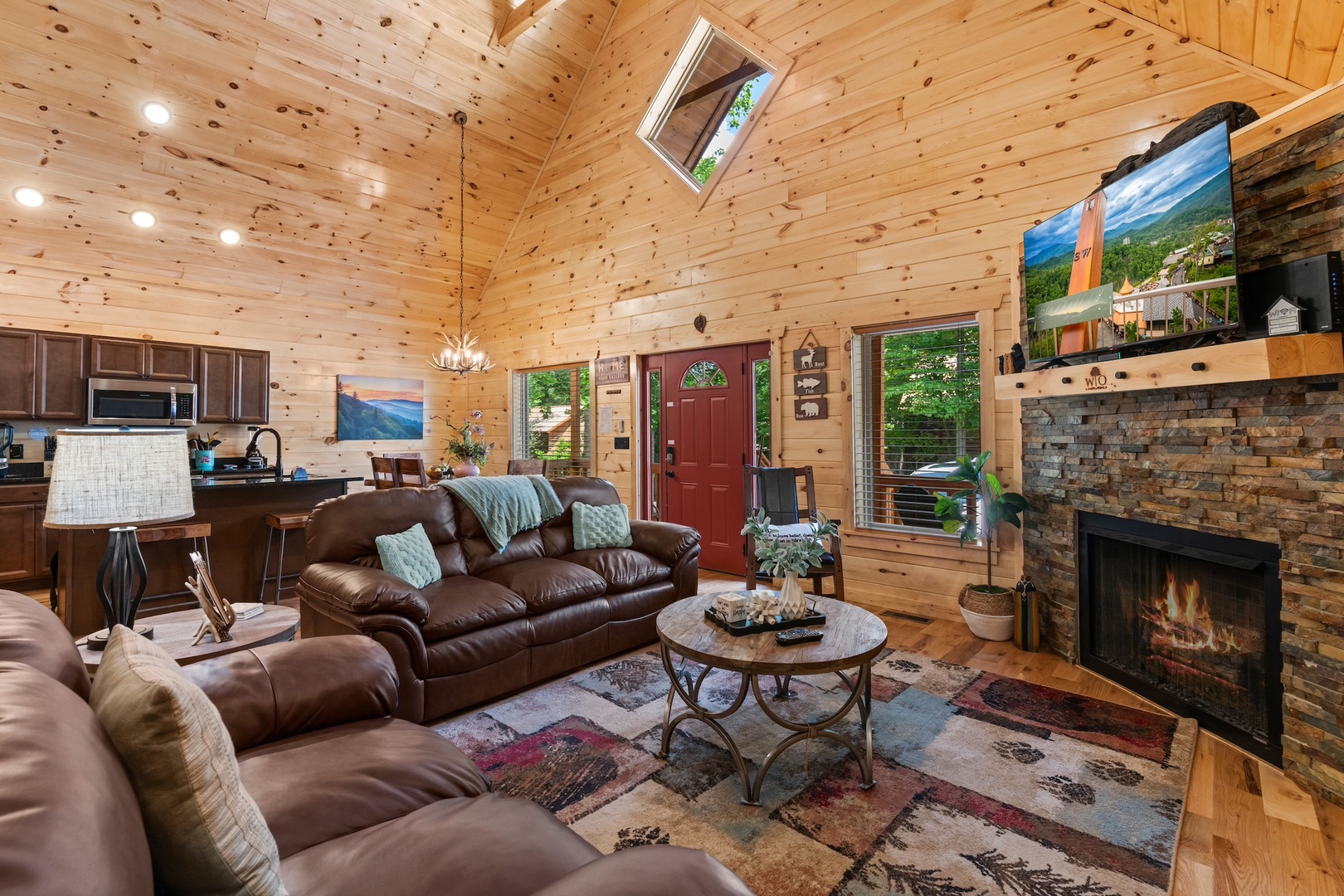 Curl up by the living room’s seasonal fireplace & stream your favorites