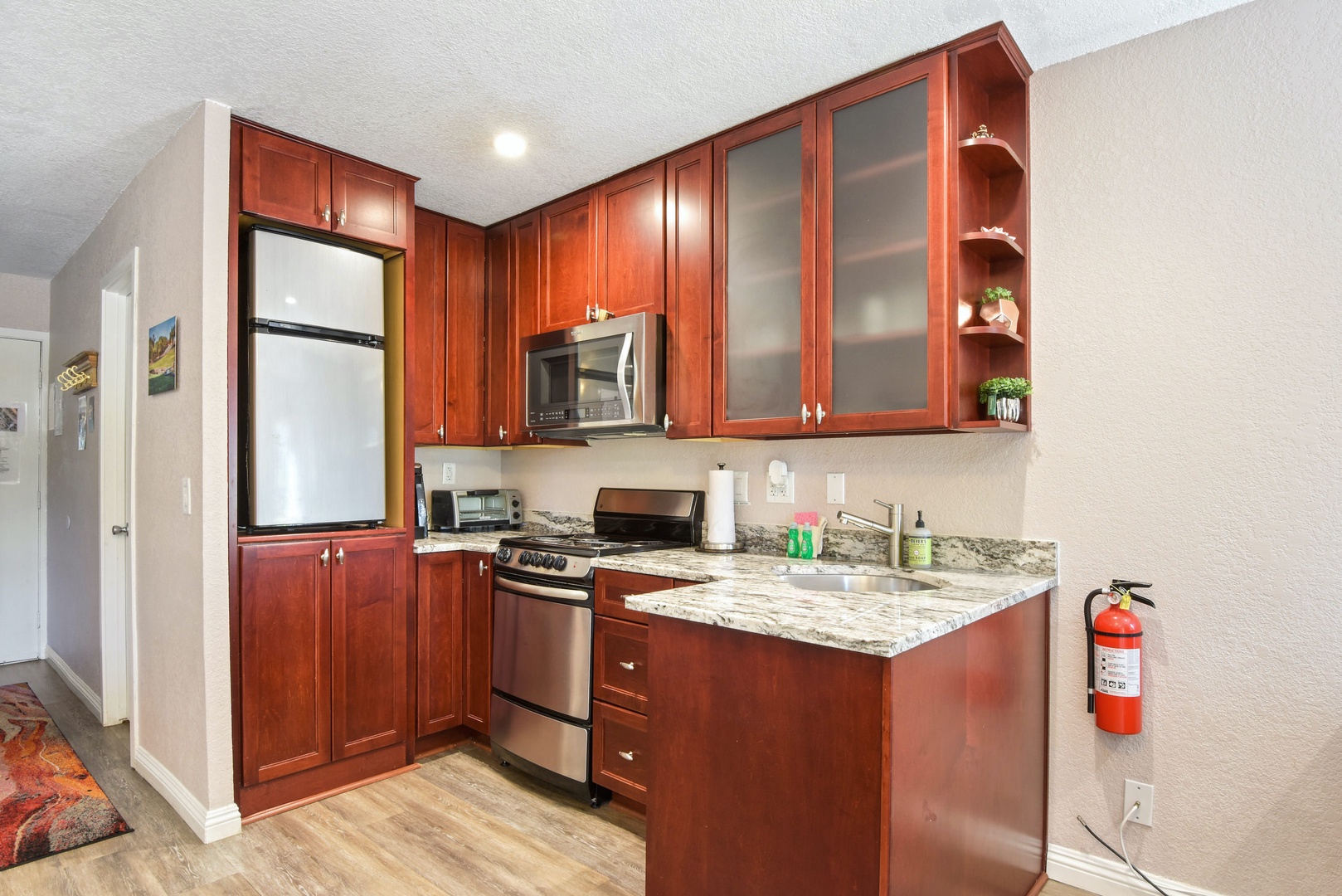 Kitchen with toaster oven, Keurig, slow cooker and more
