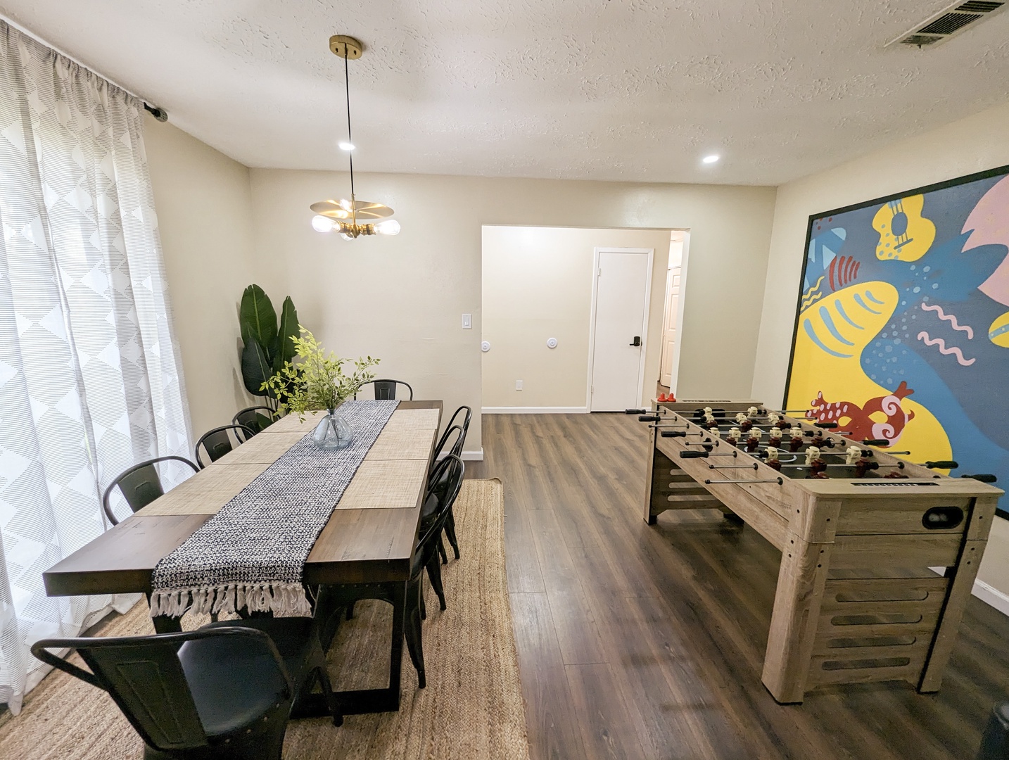 Gather for meals & friendly game nights in the dining/game room!