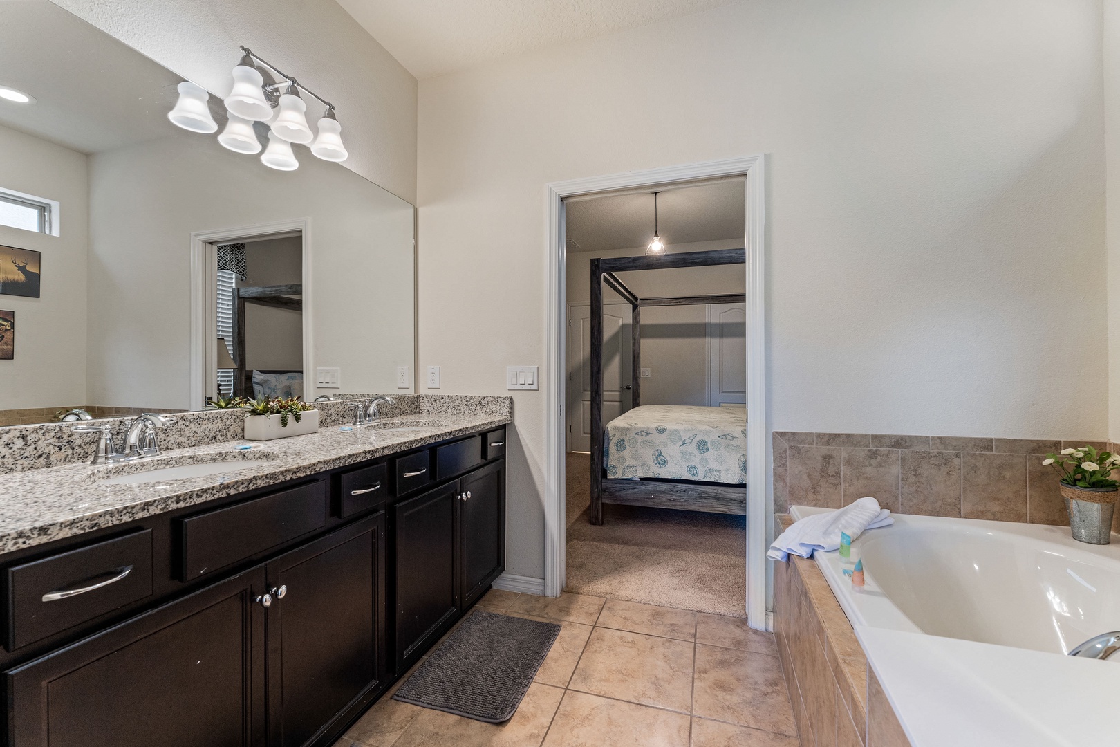 Ensuite bathroom with separate shower and soaking tub