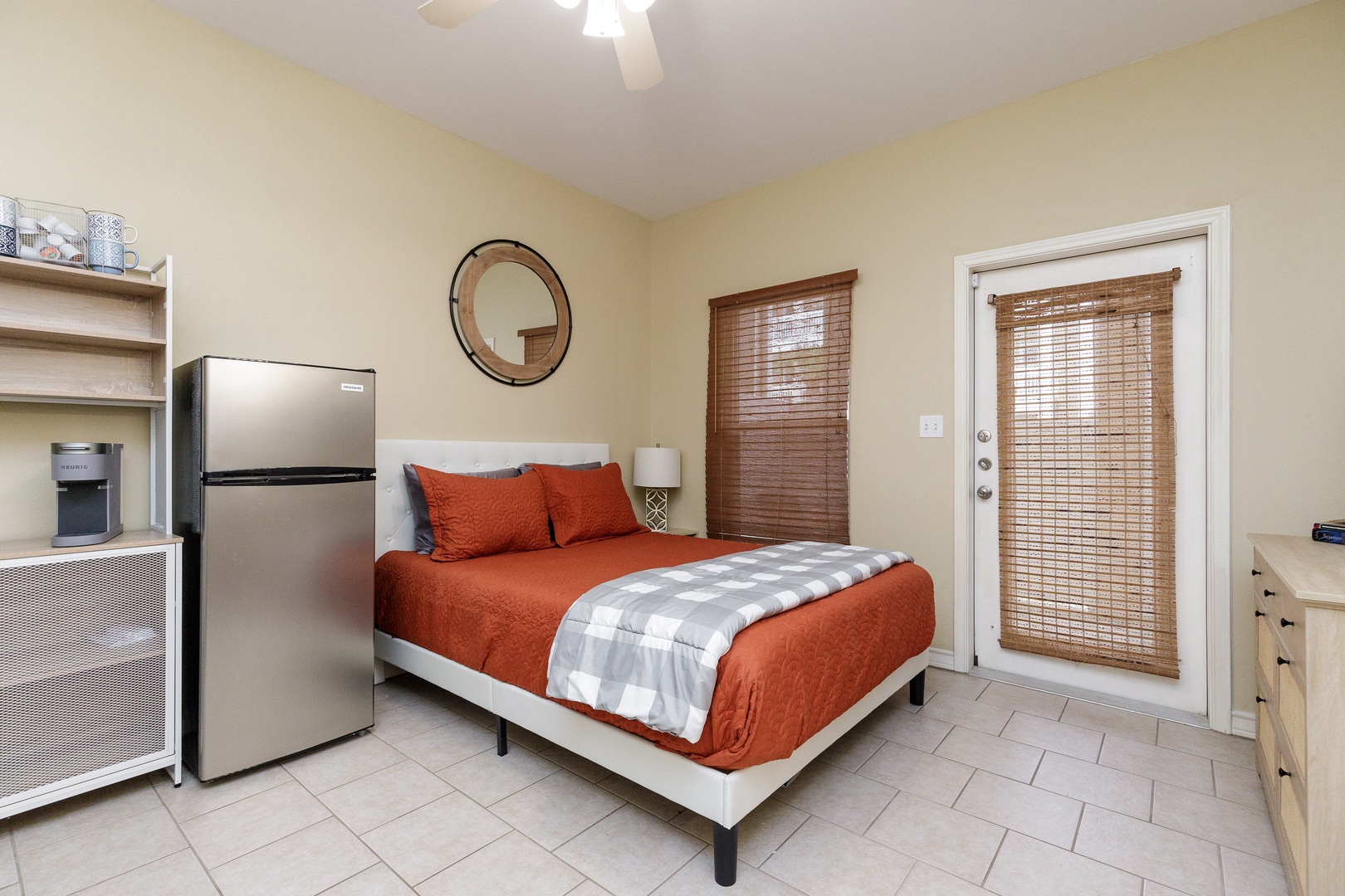 This 1st-floor queen suite boasts a private bath, Smart TV, kitchenette area, & deck access