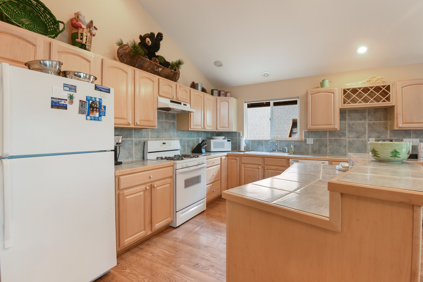 Kitchen with drip coffee maker, blender, dishwasher and more