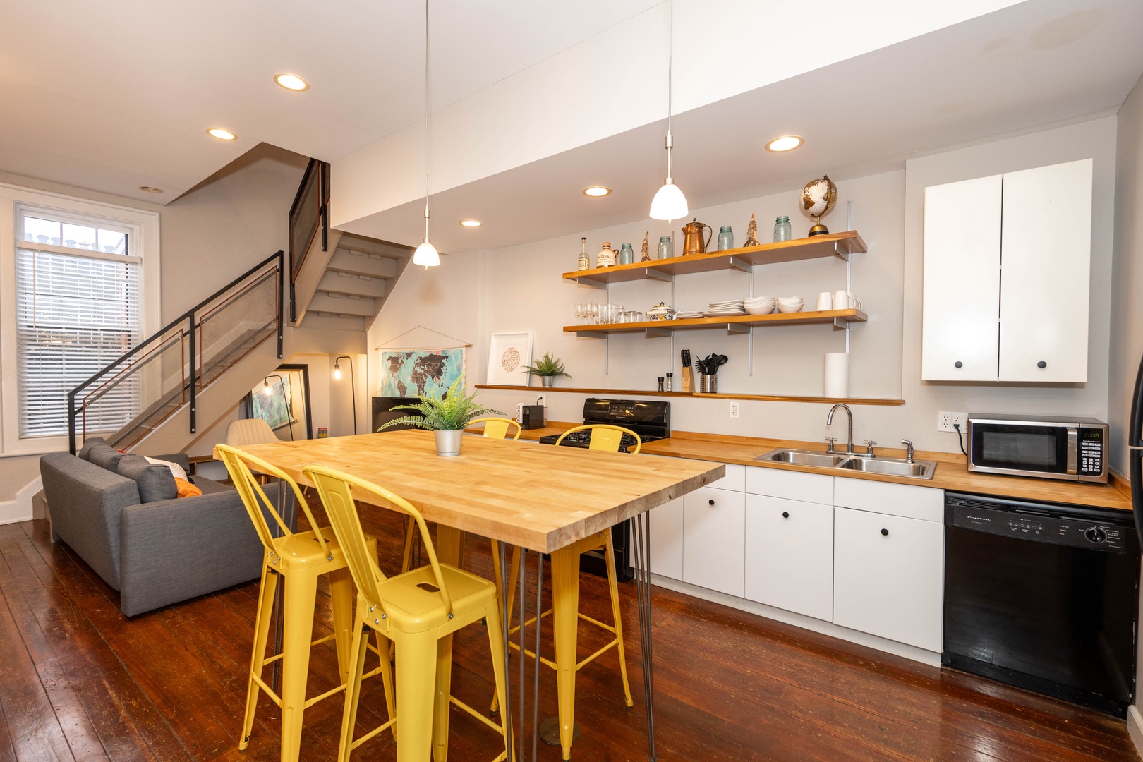 The chic eat-in kitchen offers ample space & all the comforts of home