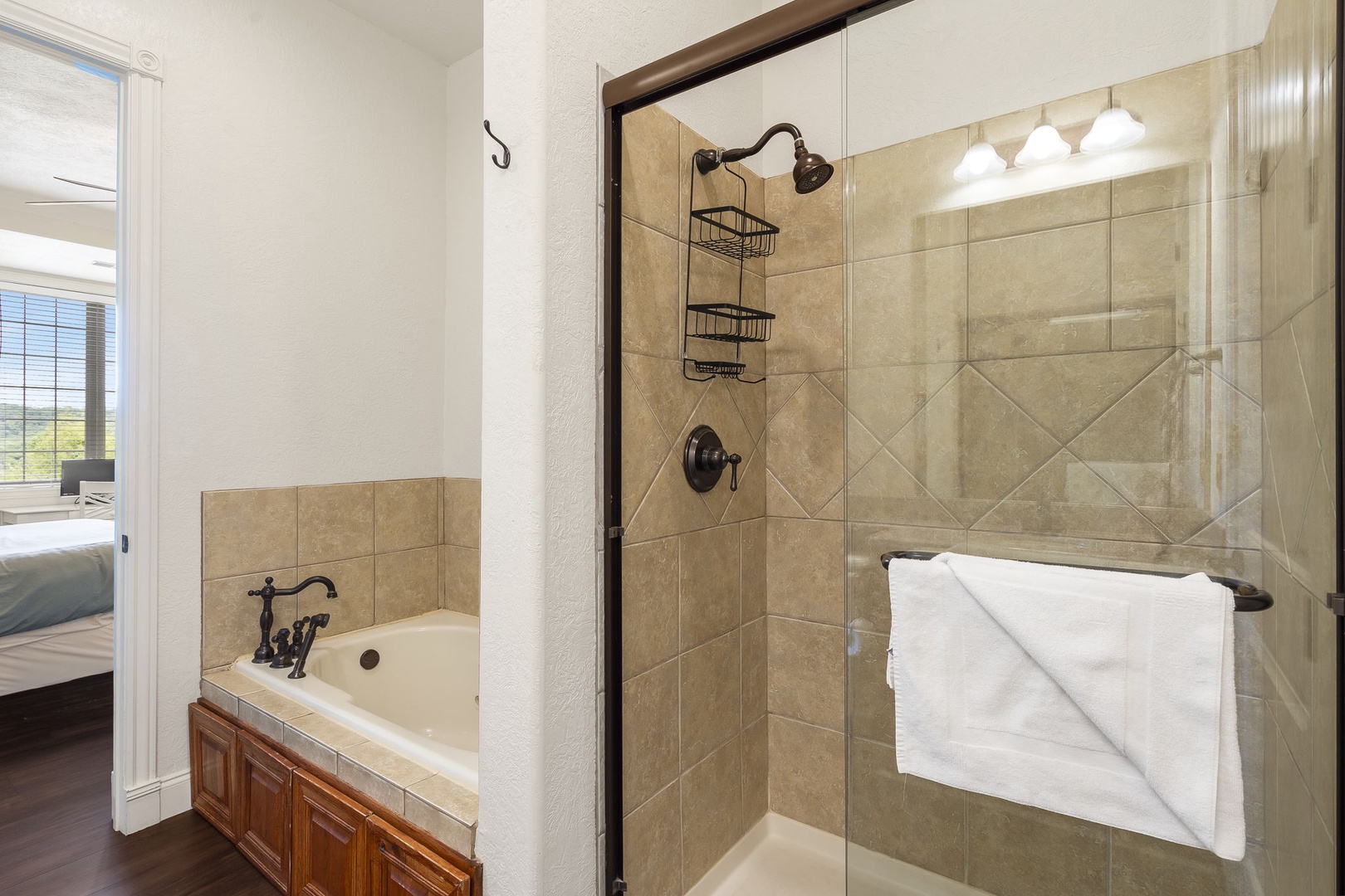 The spacious king en suite offers dual vanities & separate shower/soaking tub