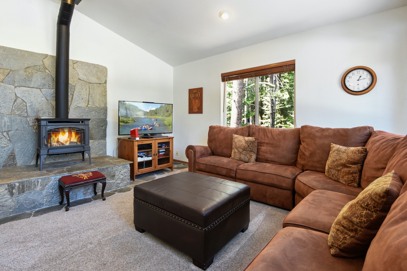 2nd living room with wood burning fireplace, Smart TV, kids play area