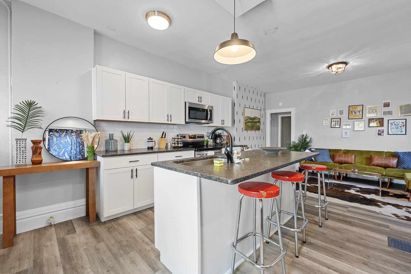 Enjoy the breezy, open layout of Apartment 1164’s main living spaces