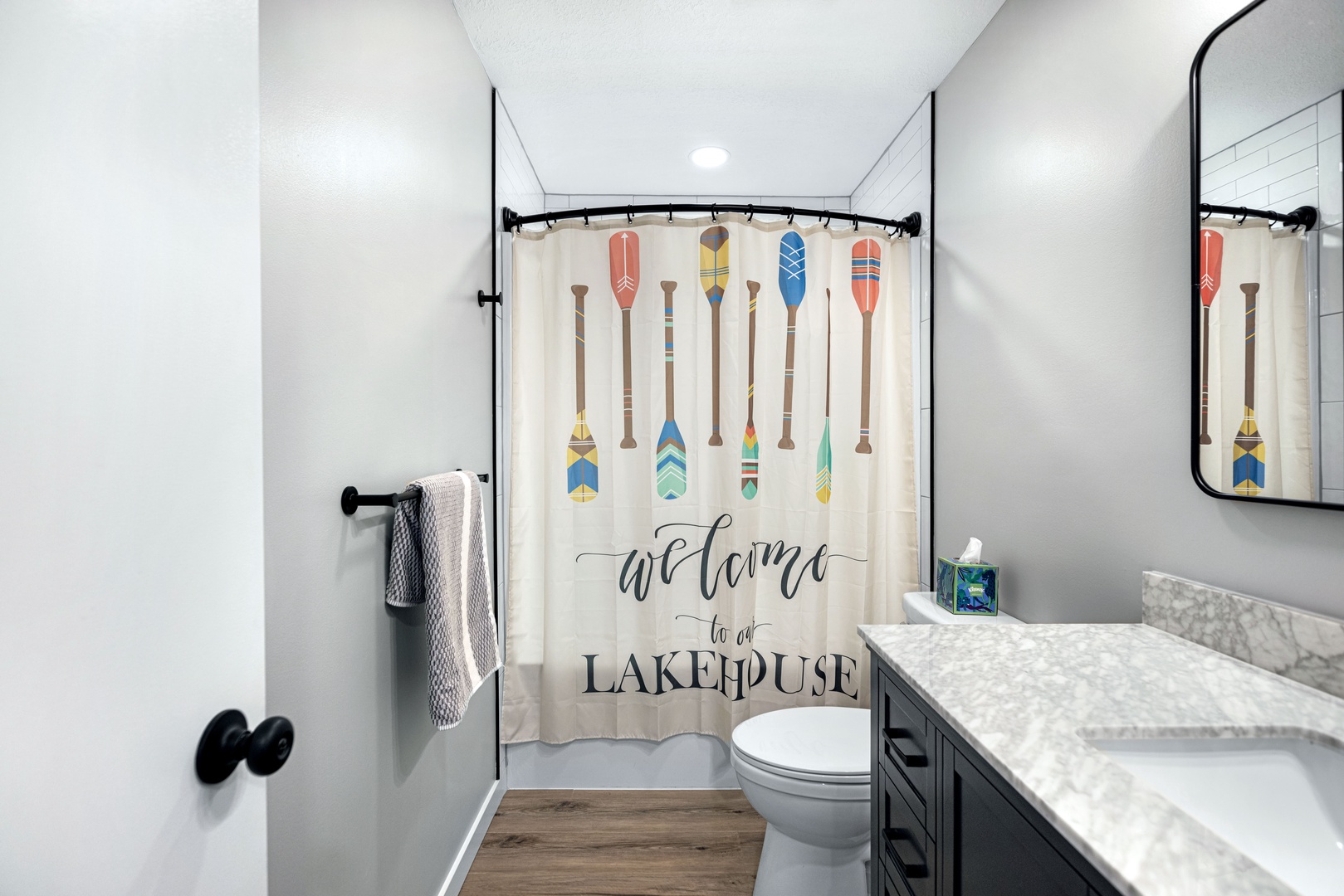 Shared bathroom with shower/tub combo