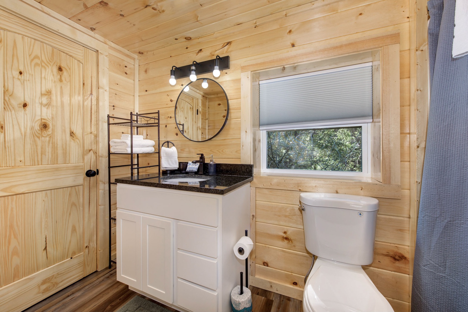 The king ensuite offers a single vanity & shower/tub combo