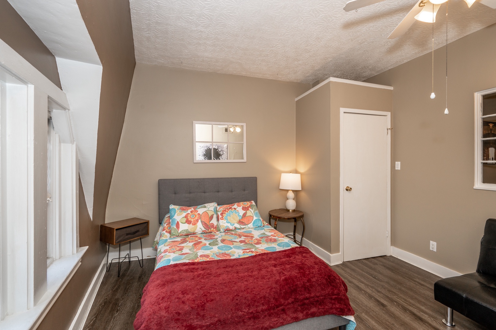 This condo’s spacious second bedroom offers a full bed & Smart TV
