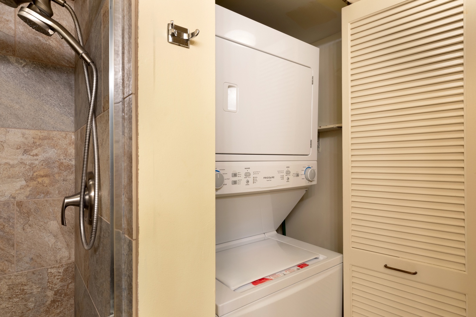 Primary bathroom with washer & dryer