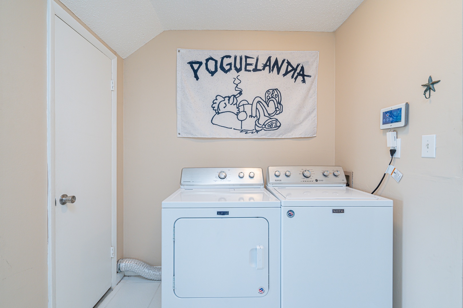 Private laundry is available for your stay, tucked away off the living area