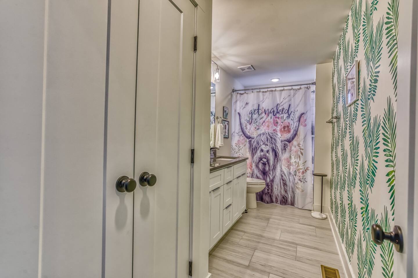 This 3rd floor en suite includes a double vanity & shower/tub combo