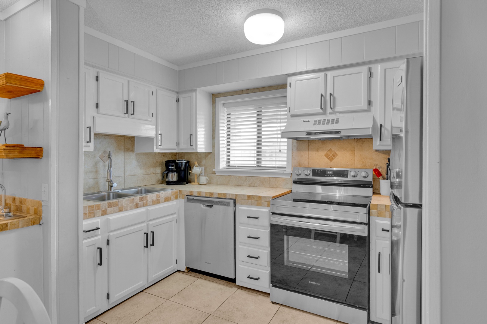 Bright fully equipped kitchen to craft culinary delights