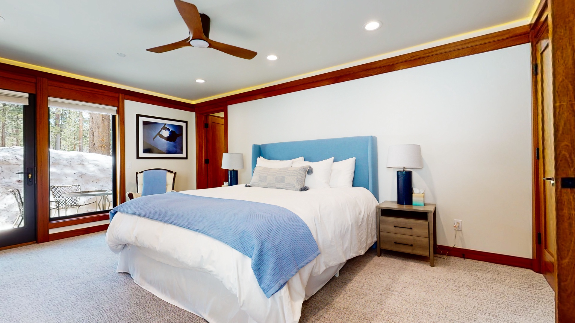 The 1st floor king suite boasts an en suite, Smart TV, deck access, and additional queen trundle