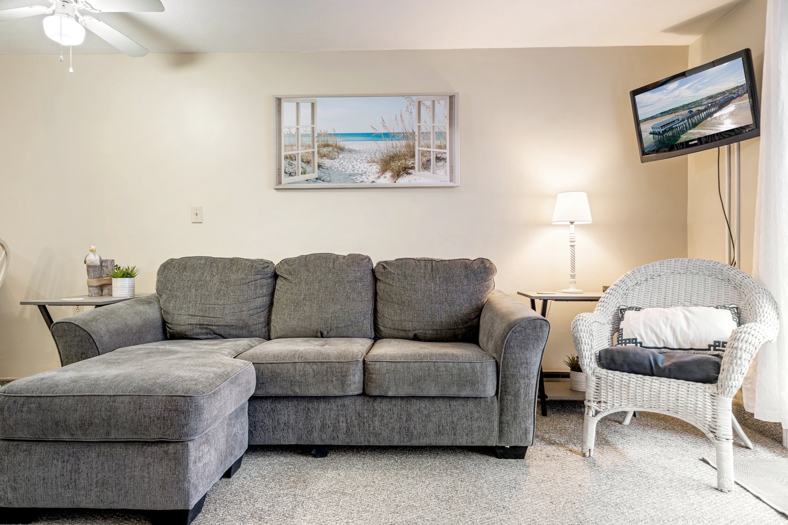 Living area with queen sofa sleeper and Smart TV