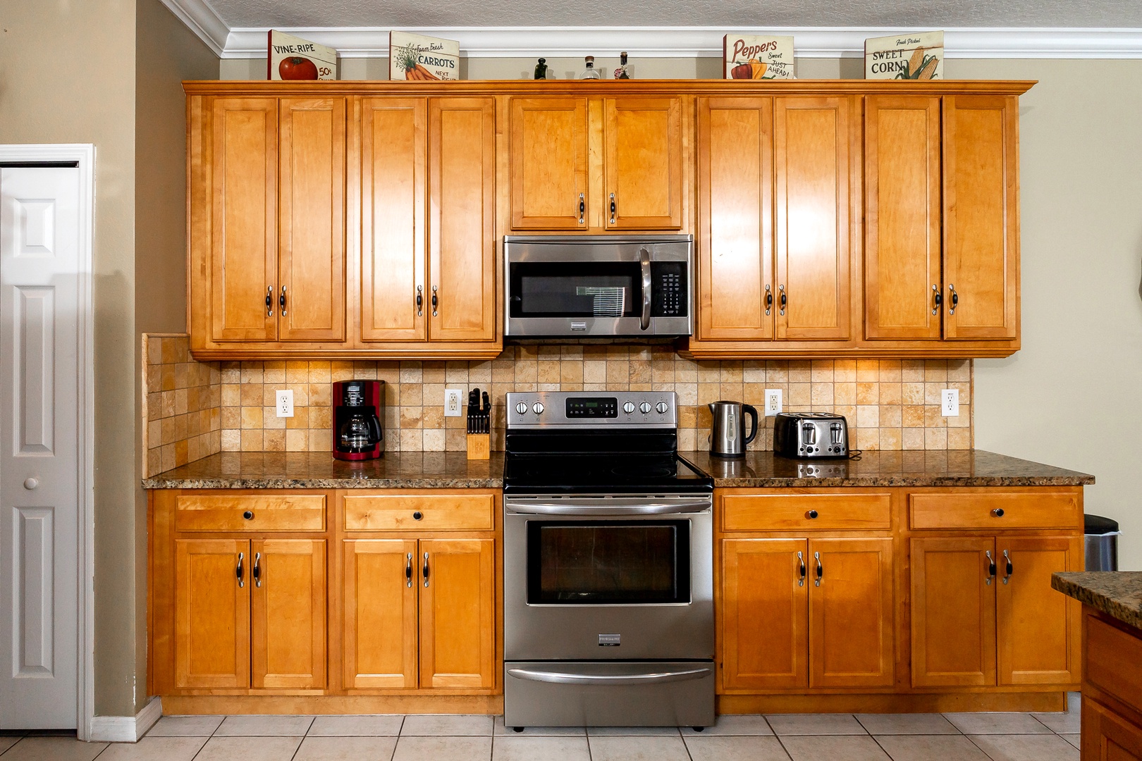 The open, well-equipped kitchen offers ample space & all the comforts of home