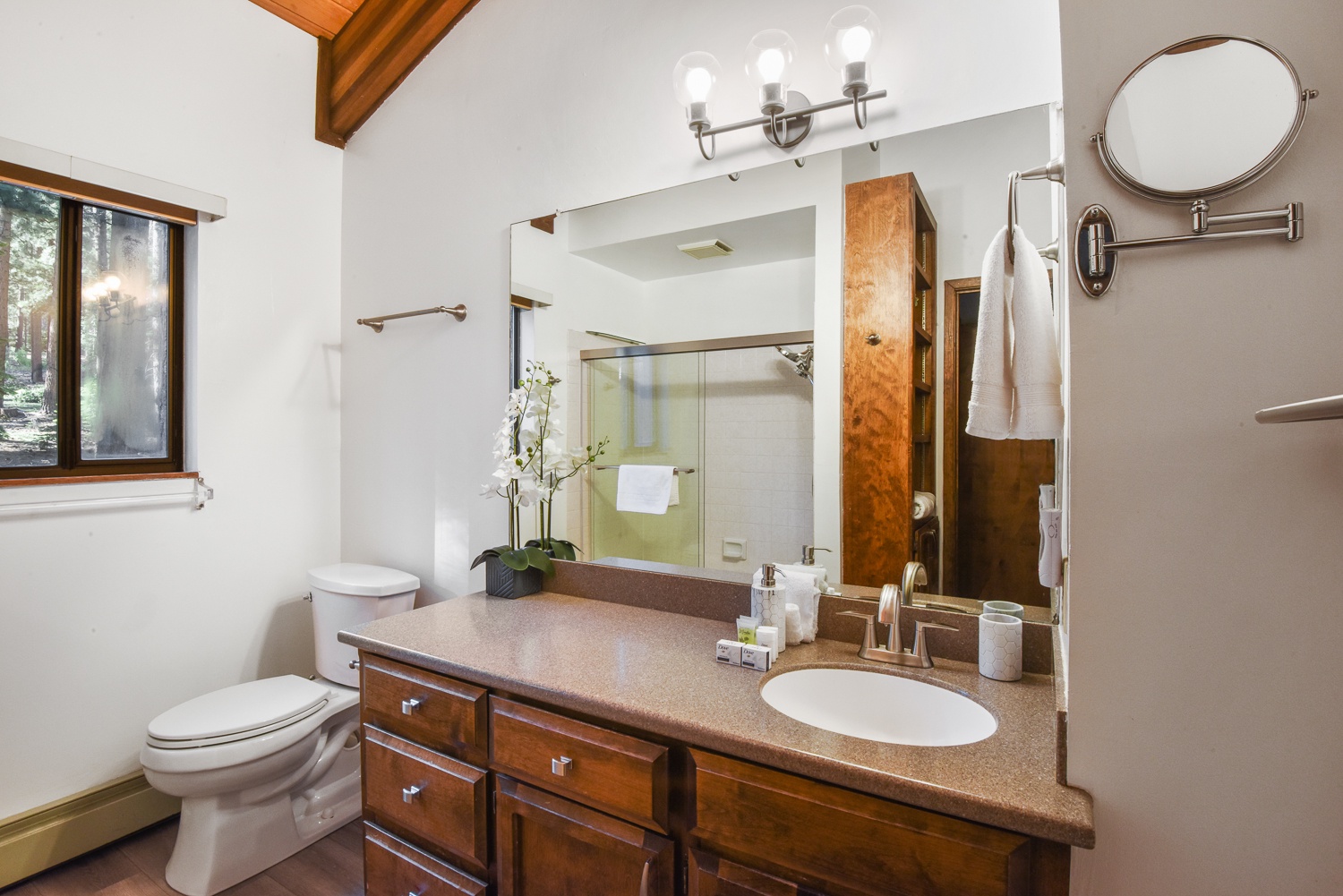 Unit #3: The 3rd floor full bathroom offers a large single vanity & shower/tub combo
