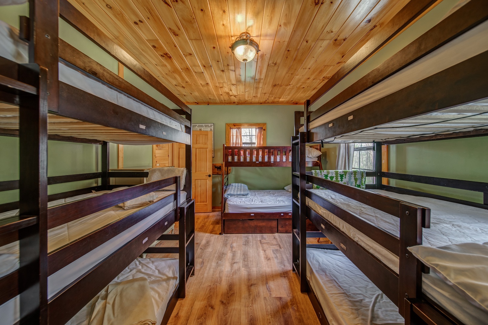 The Bunk Room offers ample sleeping space with 7 Twin Bunks and 1 Full Bunk