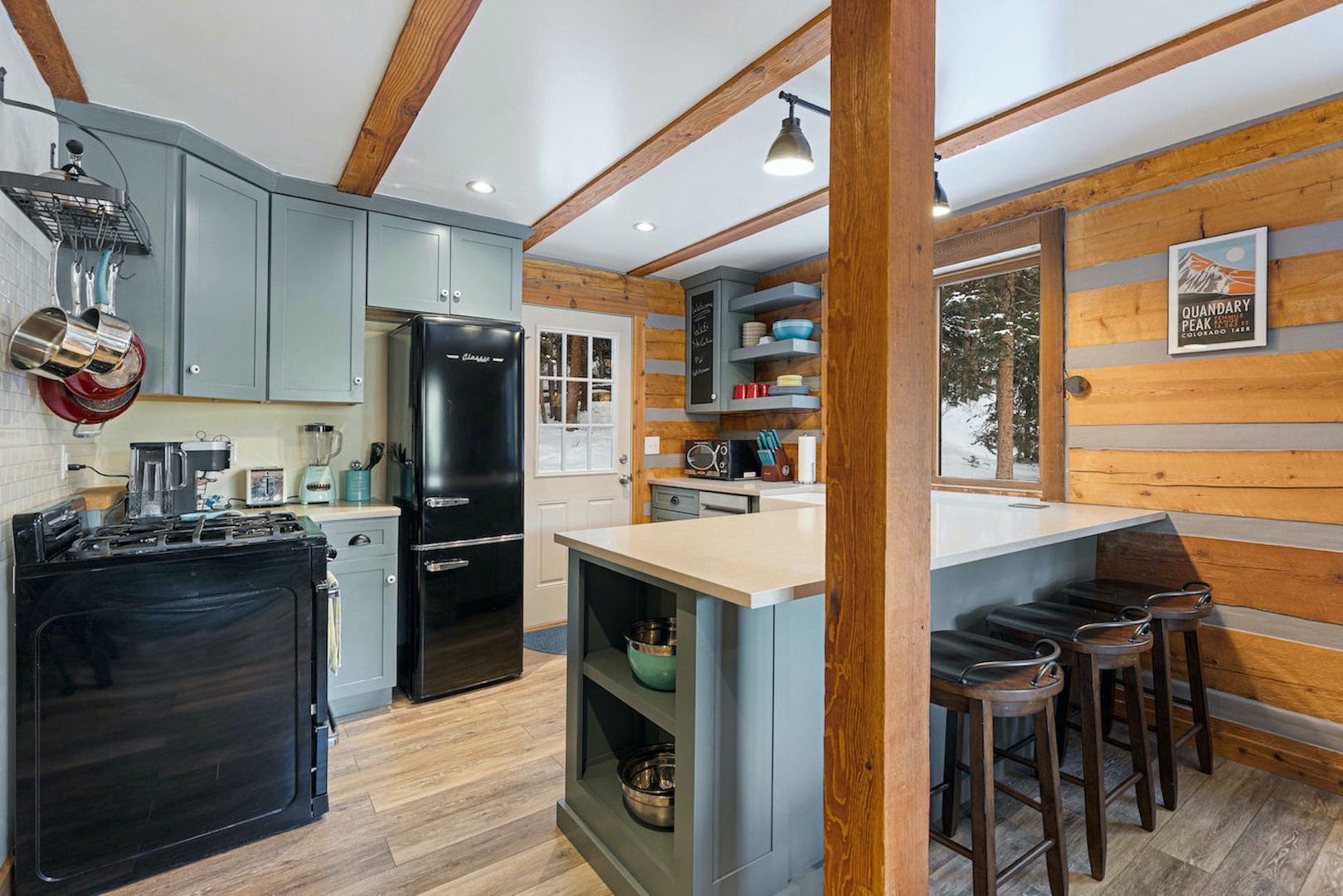 The open, inviting kitchen offers ample space & all the comforts of home